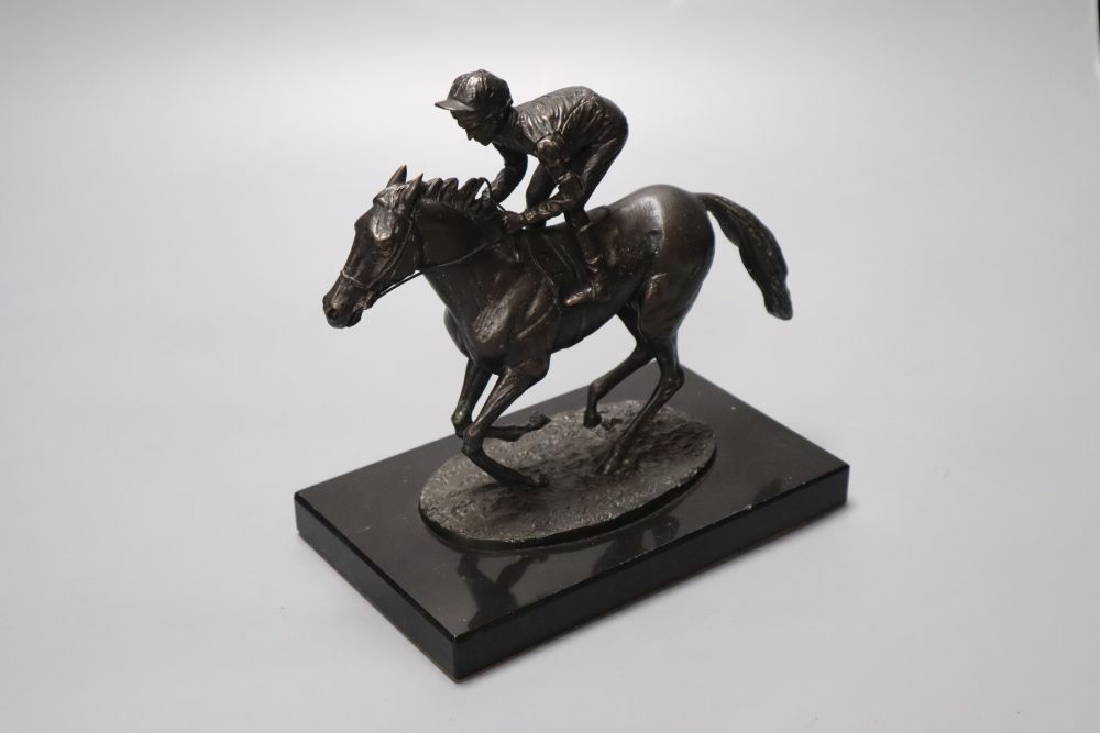 David Cornell, 1985. A cast bronze racehorse and jockey, entitled Champion Finish, on slate plinth, height 20cm